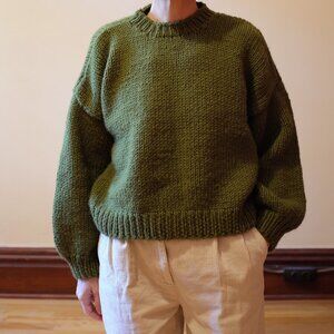 Handknitted green swaeter